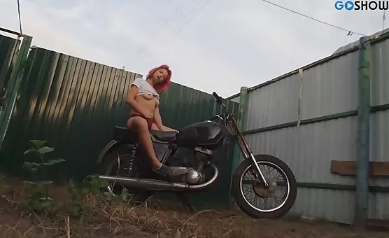 Erotic Bike Tease Tantalizing Touch Near Motorcycle